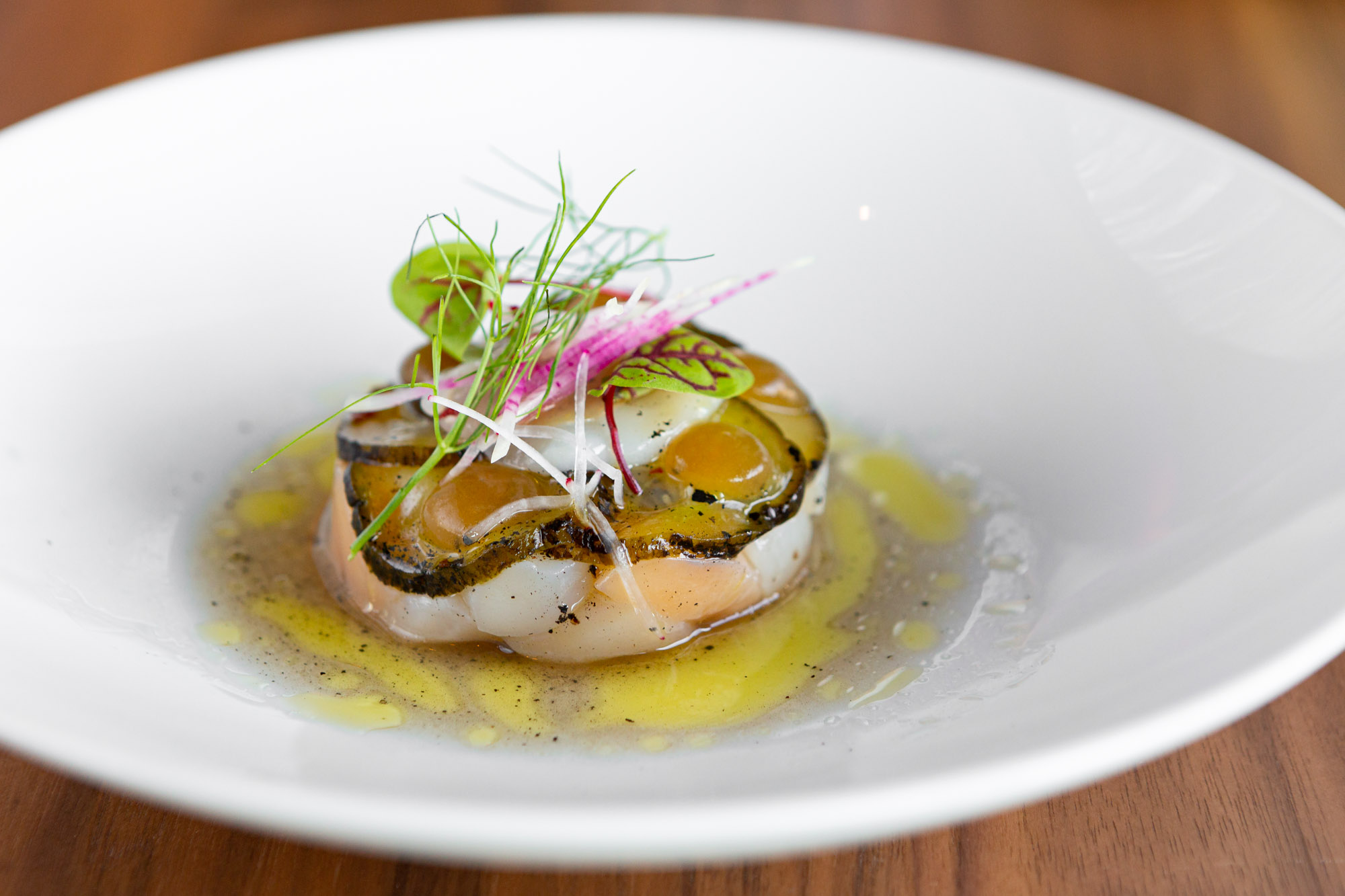 Iced Digby Scallop Crudo with charred dill pickles and sherry