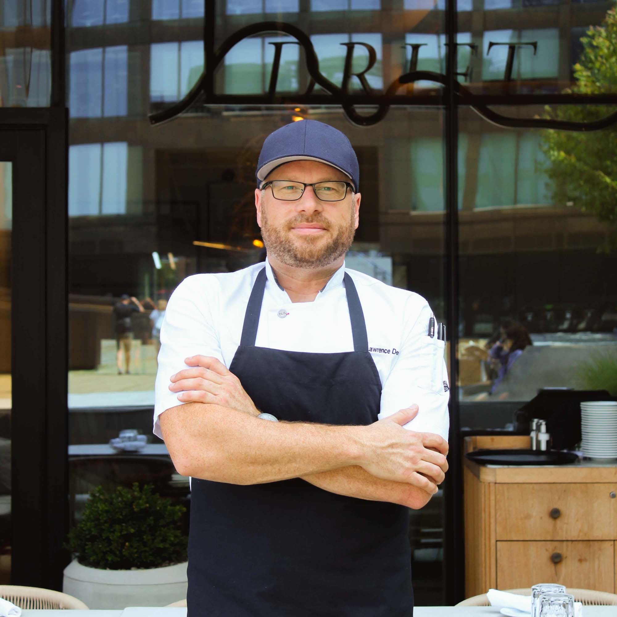 Chef Lawrence stands in front of drift restaurant
